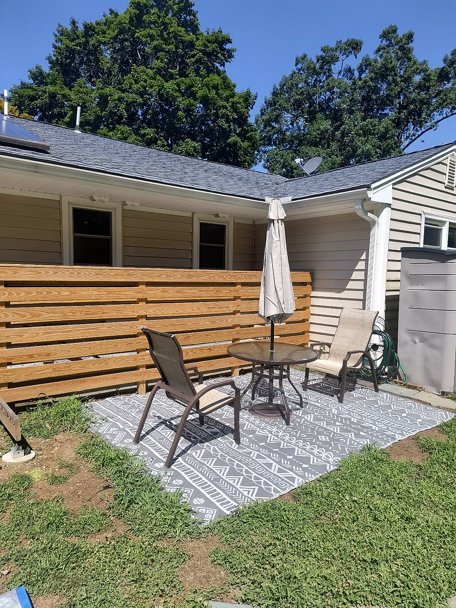 Exterior patio area with new market umbrella