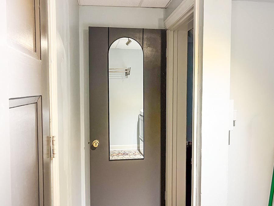 Full length mirror in laundry room