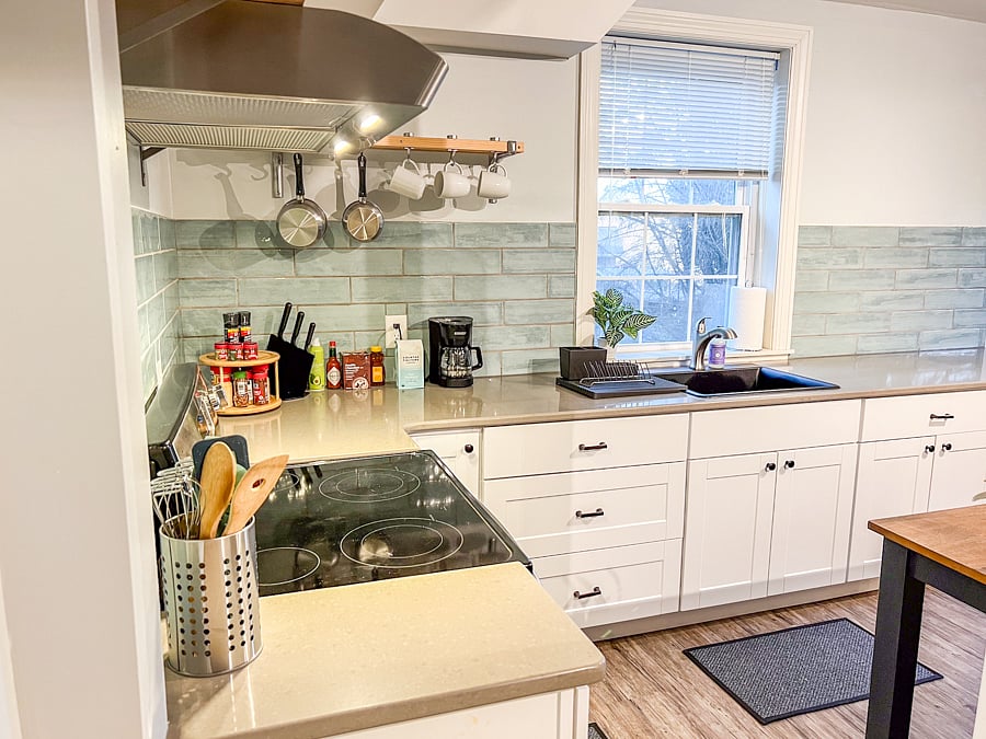 Kitchen space with pantry storage, full size kitchen appliances, kitchen basics.