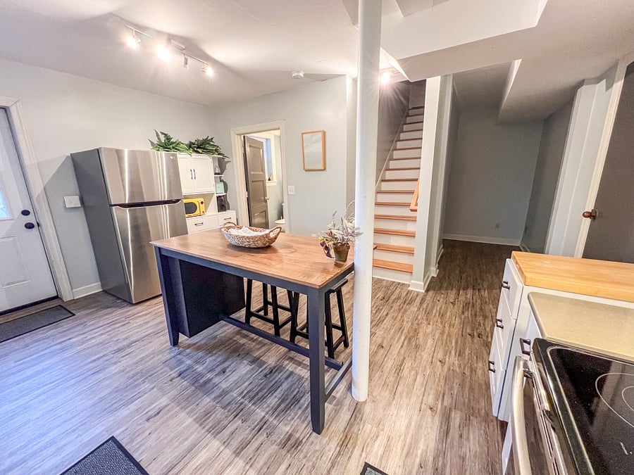 Kitchen space with pantry storage, full size kitchen appliances, kitchen basics.