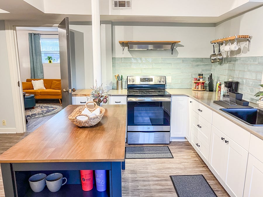 Kitchen space with pantry storage, full size kitchen appliances, kitchen basics.
