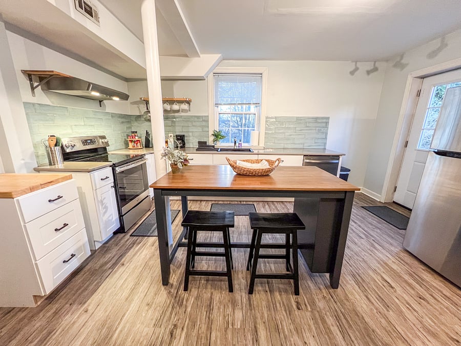 Kitchen space with pantry storage, full size kitchen appliances, kitchen basics.