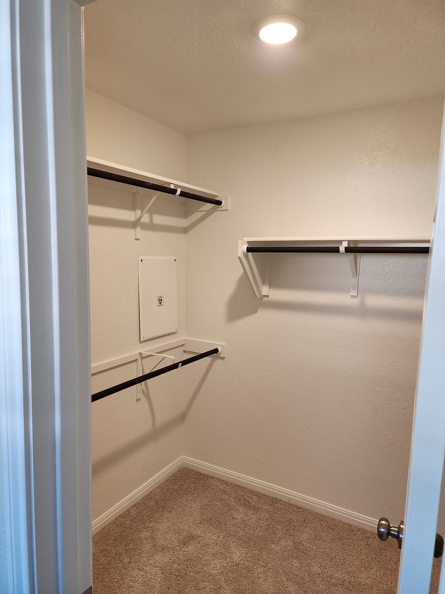 Master closet photo 1/2 off of mast bath