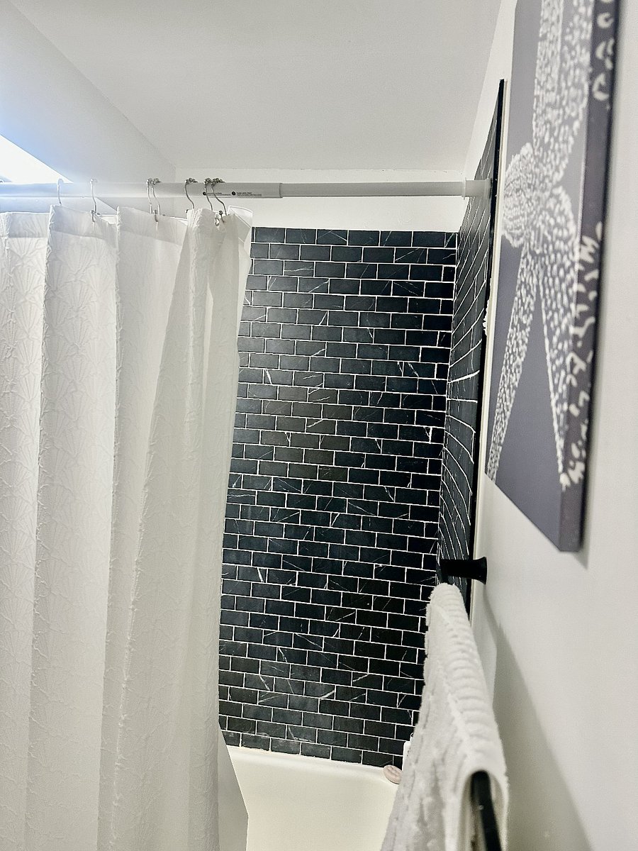 Newly tiled and updated bathroom