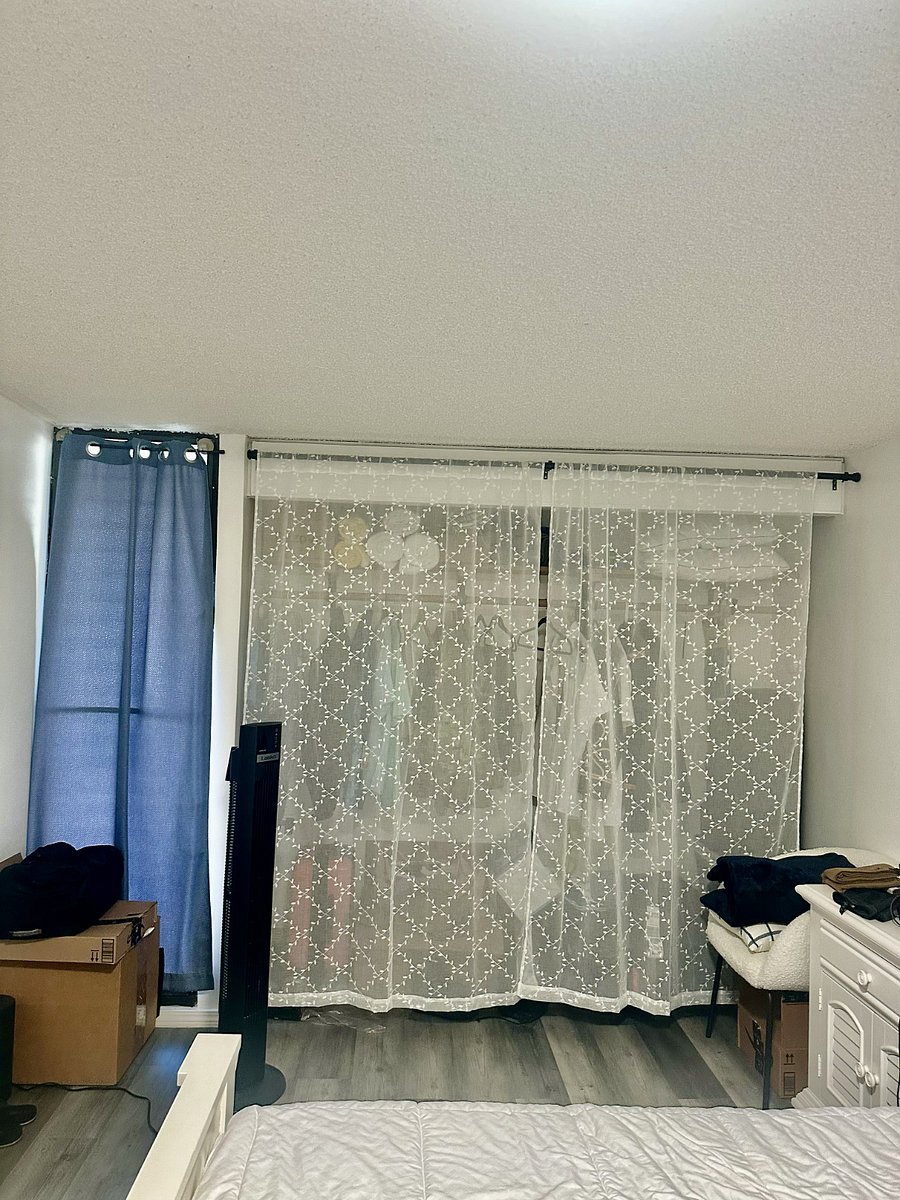 large bedroom closet with storage space