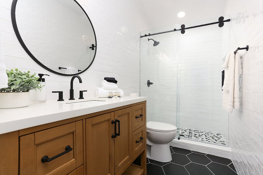 Hallway Bathroom : a fully renovated, modern bathroom just steps from the upstairs bedrooms, serving all four rooms. Enjoy a spacious, walk-in shower with sleek fixtures and fresh finishes. It is stock and ready so you can simply step in, unwind,  and relish a hotel-style cleanse in the comfort of home.
