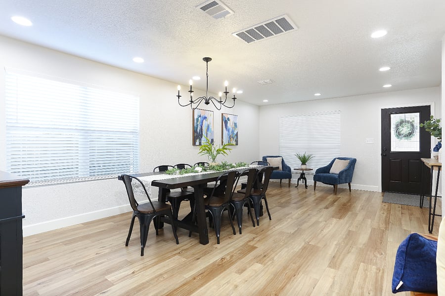 The dining area features a large table with seating for up to 10 people - perfect for family meals or entertaining guest. Just steps away , the kitchen counter offers 2 additional barstools for causal dining or morning coffee. 