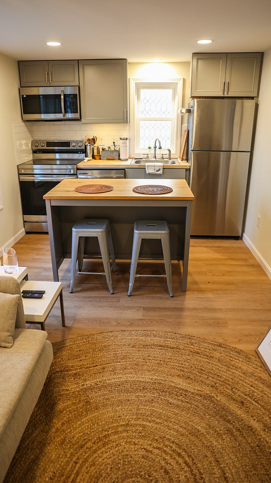 kitchen island with stools in the evening.