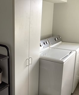 Full size washer/dryer, pantry.