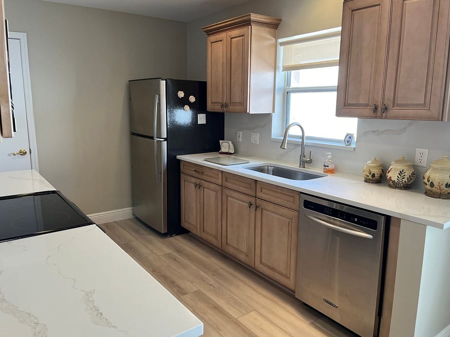 Kitchen has new appliances, fully stocked with everything you need.