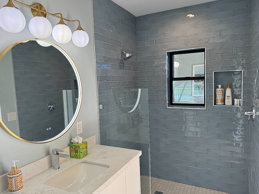 This bathroom is located adjacent to the pool and available for use anytime. 