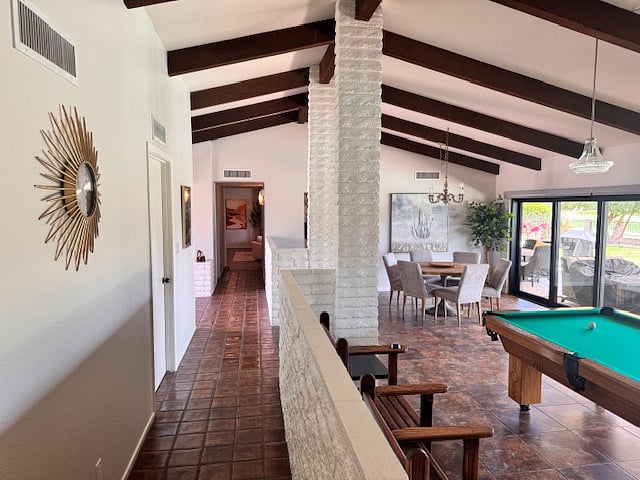 Spacious interior with cathedral ceilings.  