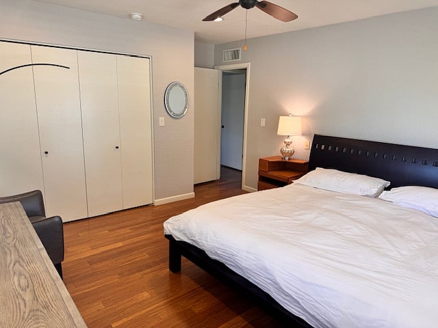 The 3rd bedroom featuring a king sized bed, lots of light and ample storage.  