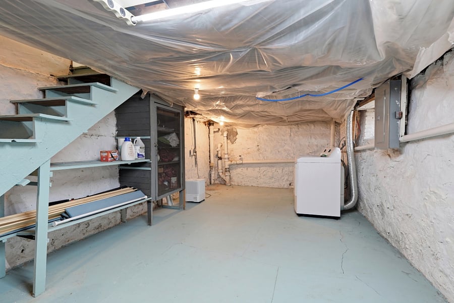 Basement equipped with washer and dryer