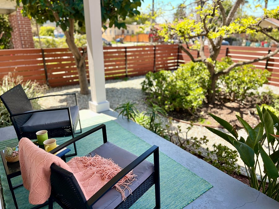 The front porch is the perfect spot to sit and rock a while, and say hello to neighbors.