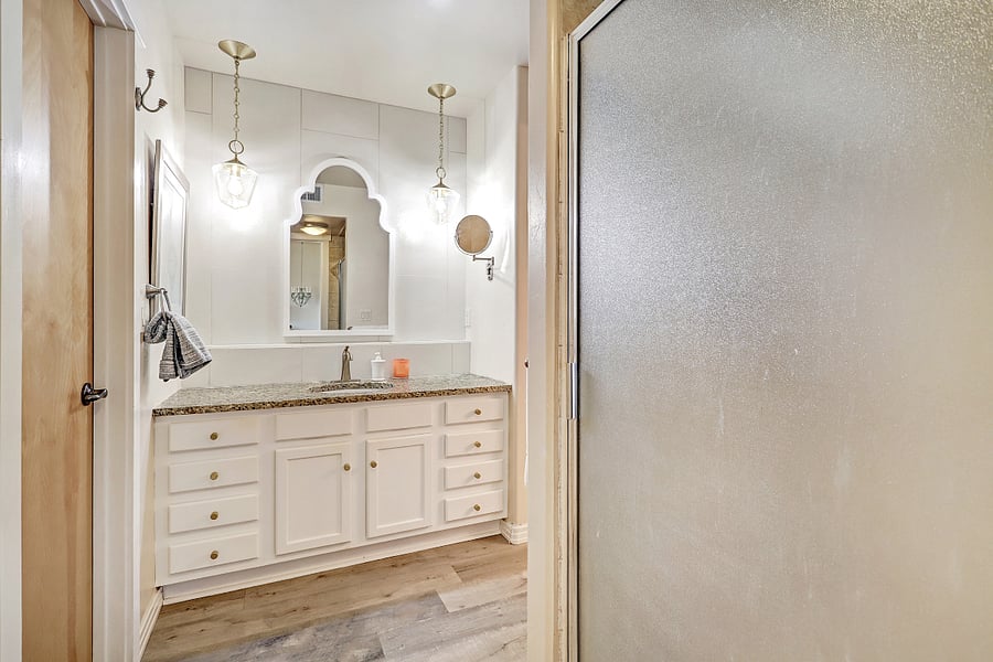 sink and separate shower off primary bedroom