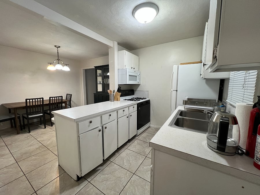 Blender, rice cooker, electric water kettle, pots, pans, plates, utensils, etc. included