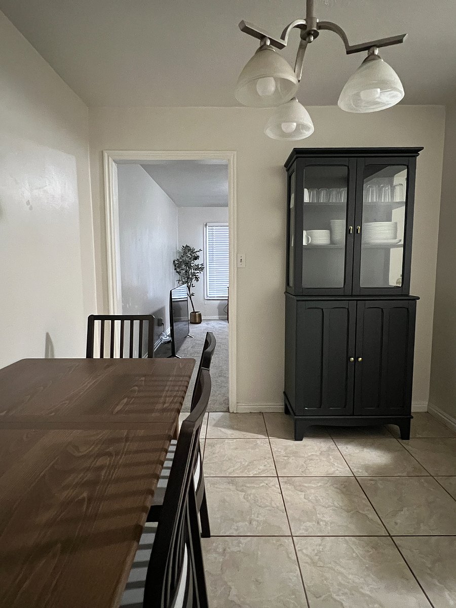 Kitchen table easily seats 4 where positioned. With hide-away leaf open, can set up to 8.