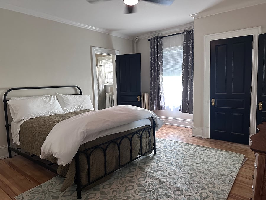 Luxury firm queen sized bed with 1000 thread count sheets and two types of pillows (four total, more if you them). Dresser, nightstand and closet. Attached bathroom with tub.
