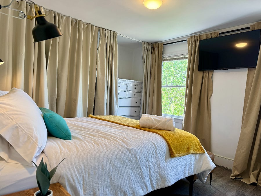 Primary Bedroom- Queen Size Bed- Wall to Wall Closet