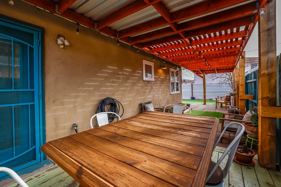 Covered deck with full outdoor dining table