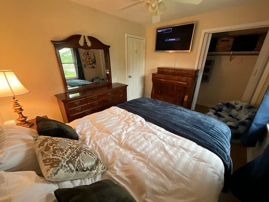 Executive with 45 Samsung TV and Firestick, beanbag chair for super lounging, large closet with much storage space, sunrise alarm with wireless phone charging, thick plush rug (w pad) for shoeless comfort