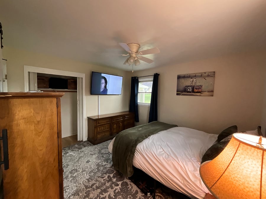 Master w 55 Samsung smart TV, sunrise alarm clock with cordless phone charger, plush comfy rugs with thick pad for barefoot joy, beanbag chair for ultimate comfort, and a super huge closet for adequate storage space, and attached bath room
