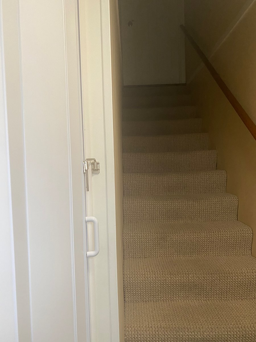 Apartment latched, stairs to homeowners living.