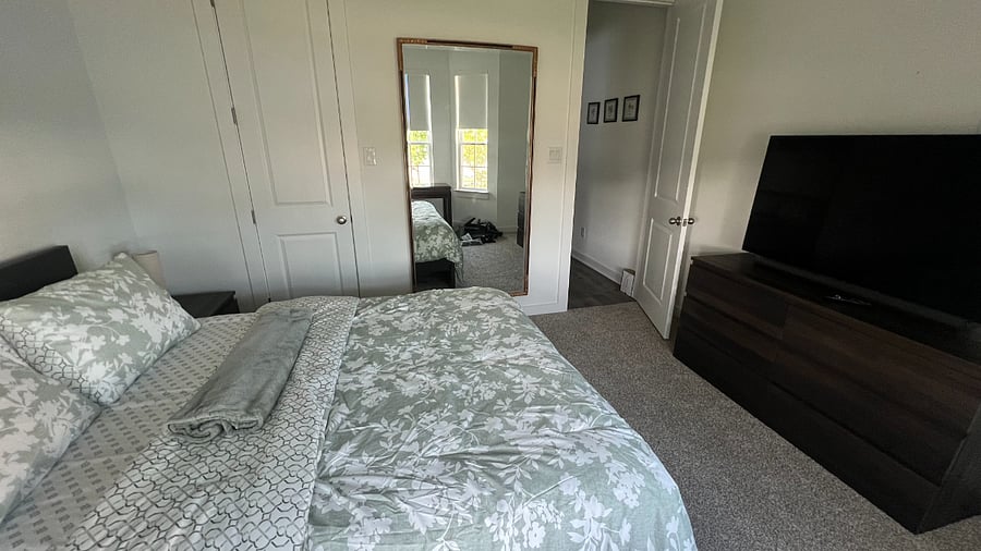 West wing bedroom one - beautiful desk with brand new 4k TV and a huge mirror.