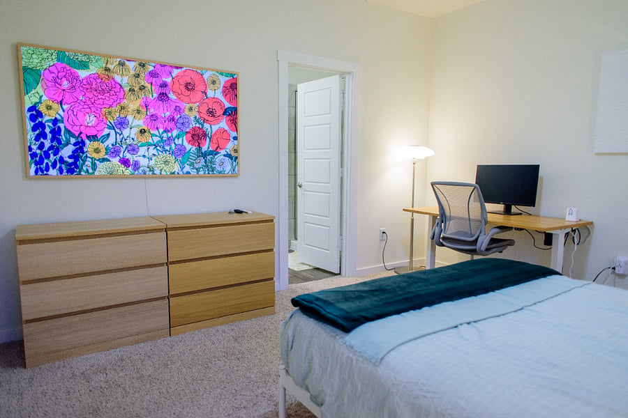 Real drawer storage, a work-ready desk, and a 4K Frame TV that doubles as rotating wall art with your private ensuite bath just steps away.