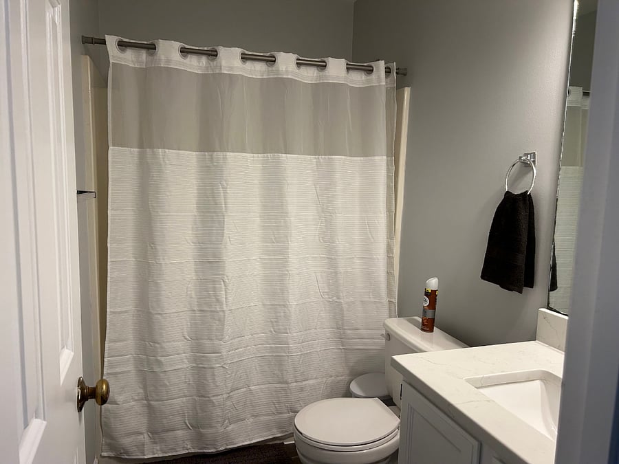 One of two full bathrooms.