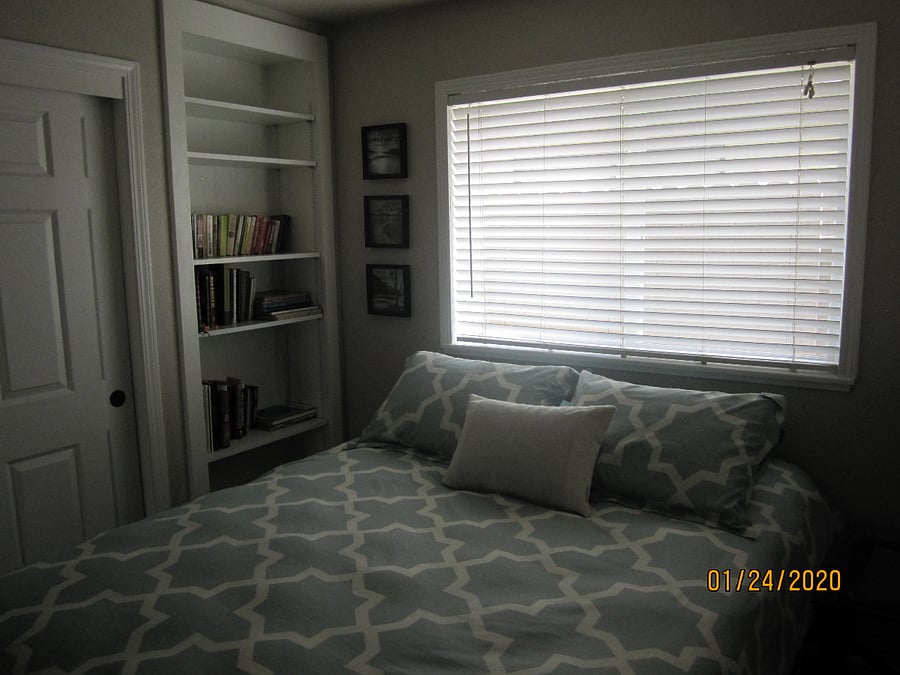 Another pic of bedroom. Windows have shutters now.