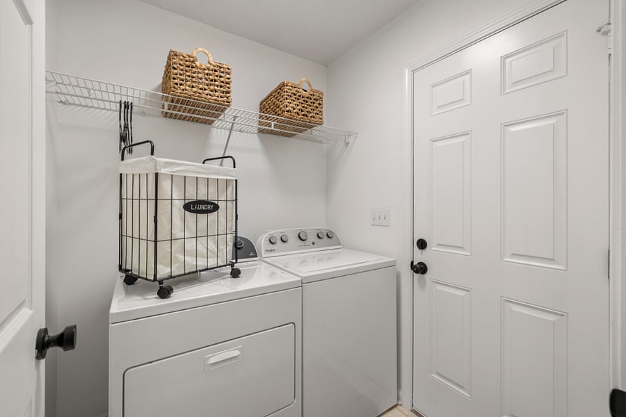 Laundry room with room for storage and W/D included ready for laundry.