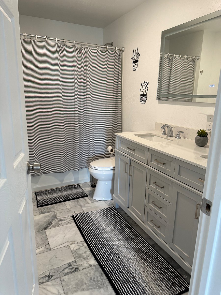 Upstairs bathroom attached to the bedroom 