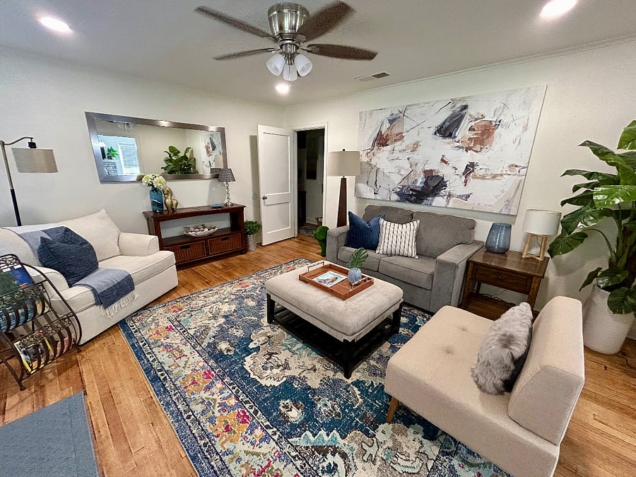 Comfortable and relaxing shared living space.Chose to relax in an oversized chair or take a nap on the sofa.