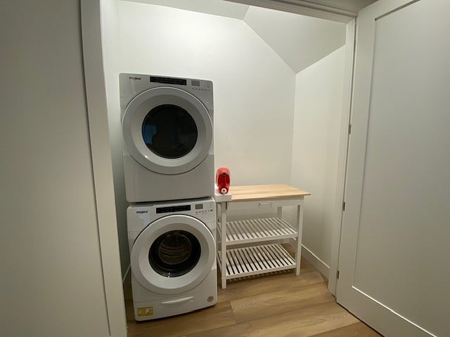 In unit laundry room with folding table, and high efficiency washer and dryer