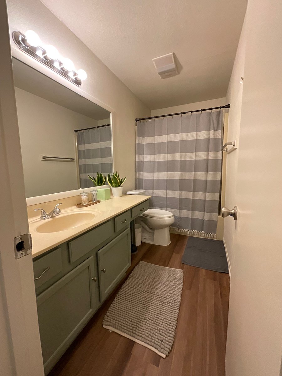 Primary bathroom with bathtub/shower combo 
