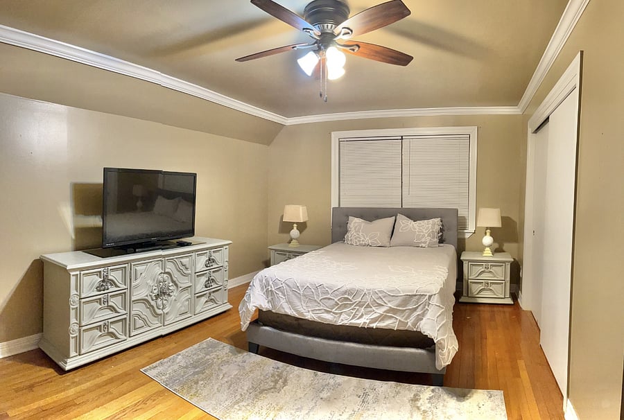 2nd level bedroom w/ queen bed and work space