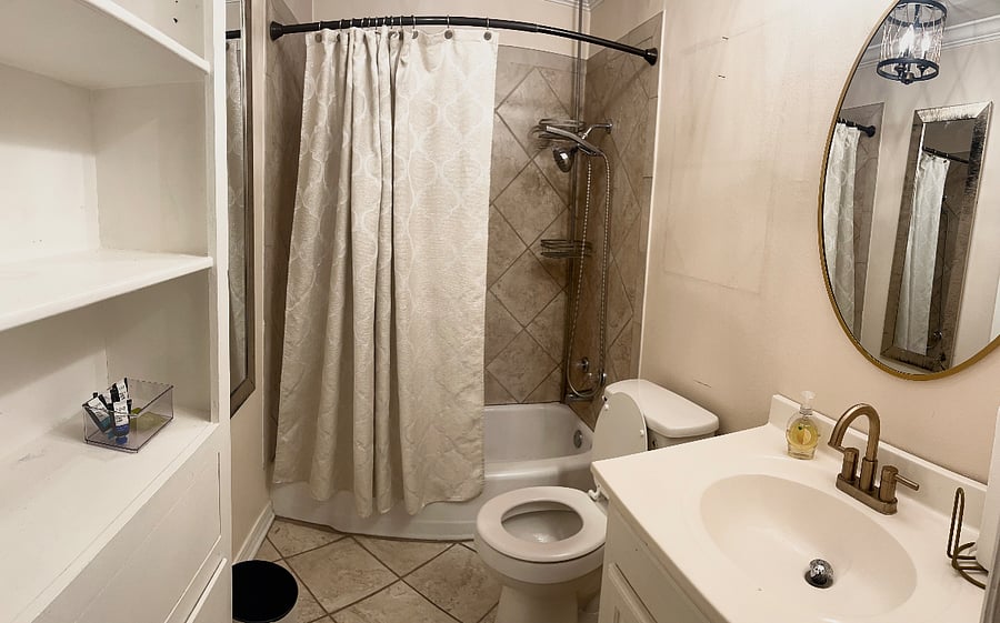 1st level full bathroom w/ all essentials and cleaning supplies