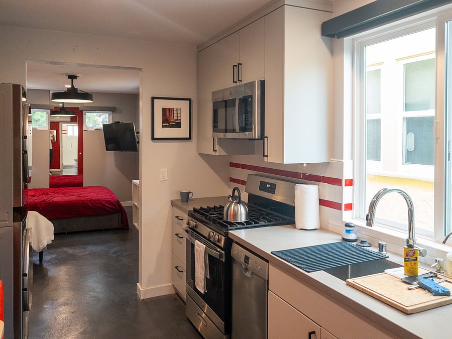 Compact and functional Kitchen with all Stainless Steel Appliances;
Full-Sized Gas Range/Stove/Microwave Hood, Compact Bosh Dishwasher, R/O Drinking Water Tap, Coffeemaker/Grinder, Toaster, Pots/Pans, Dishes/Glassware and Utensils.