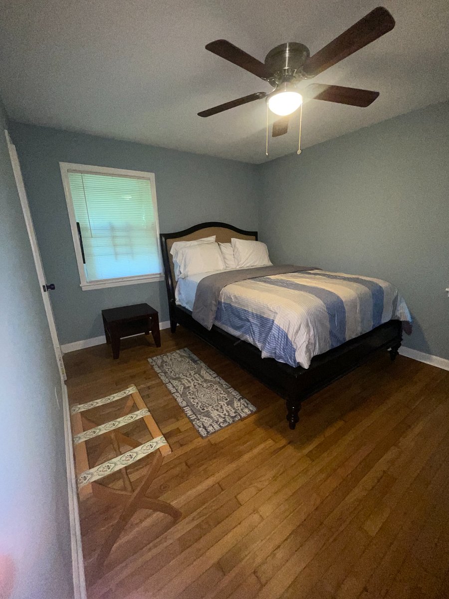 The Master bedroom is at the end of the hallway. It features a Queen sized bed, dresser, and closet. The bathroom is located next to the bed.