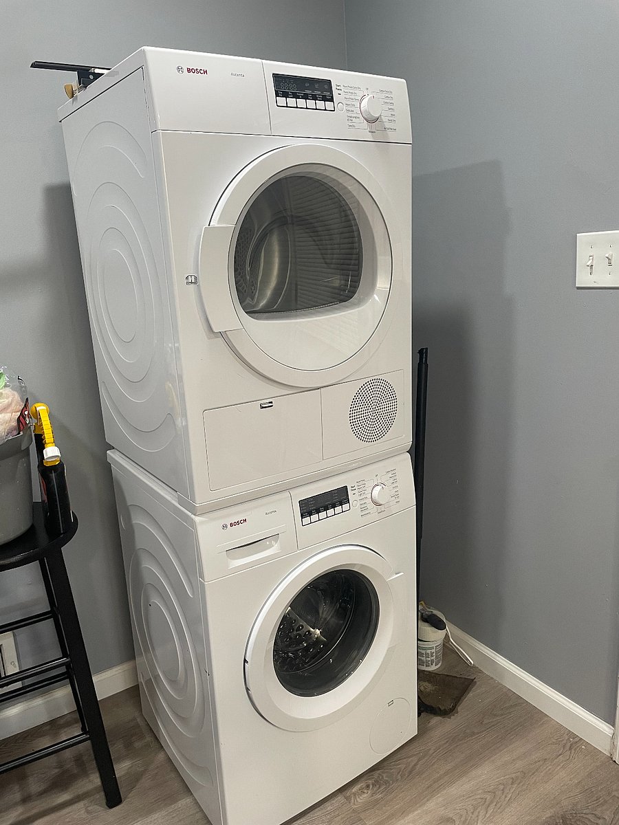 Stackable washer & dryer in the kitchen. 
