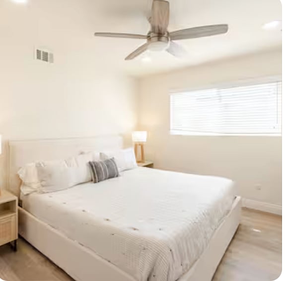 Master Bedroom - King bed, two nightstands, closet, and attached bathroom.