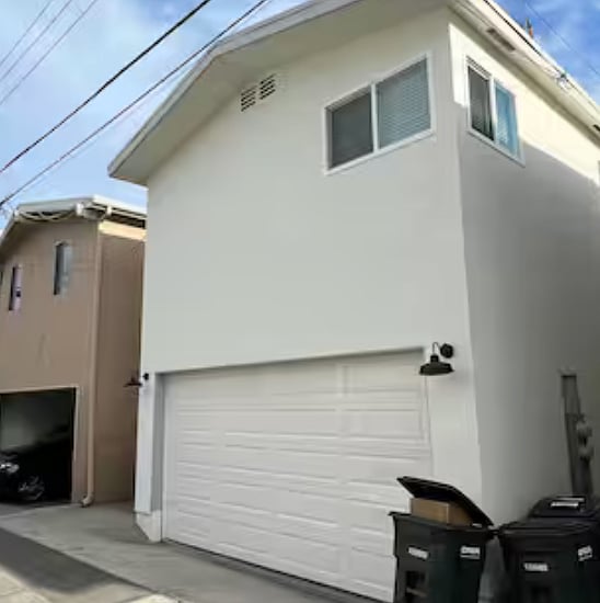 The view of the garage from the back of the unit. There is one available space on the right side of the garage