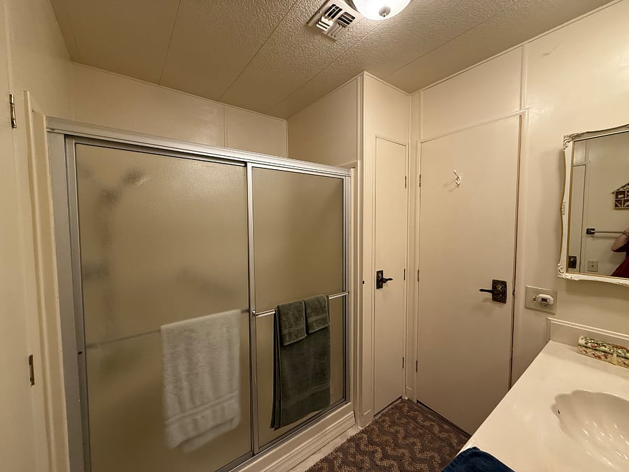 This shows the door entering to your bedroom and walk in shower.