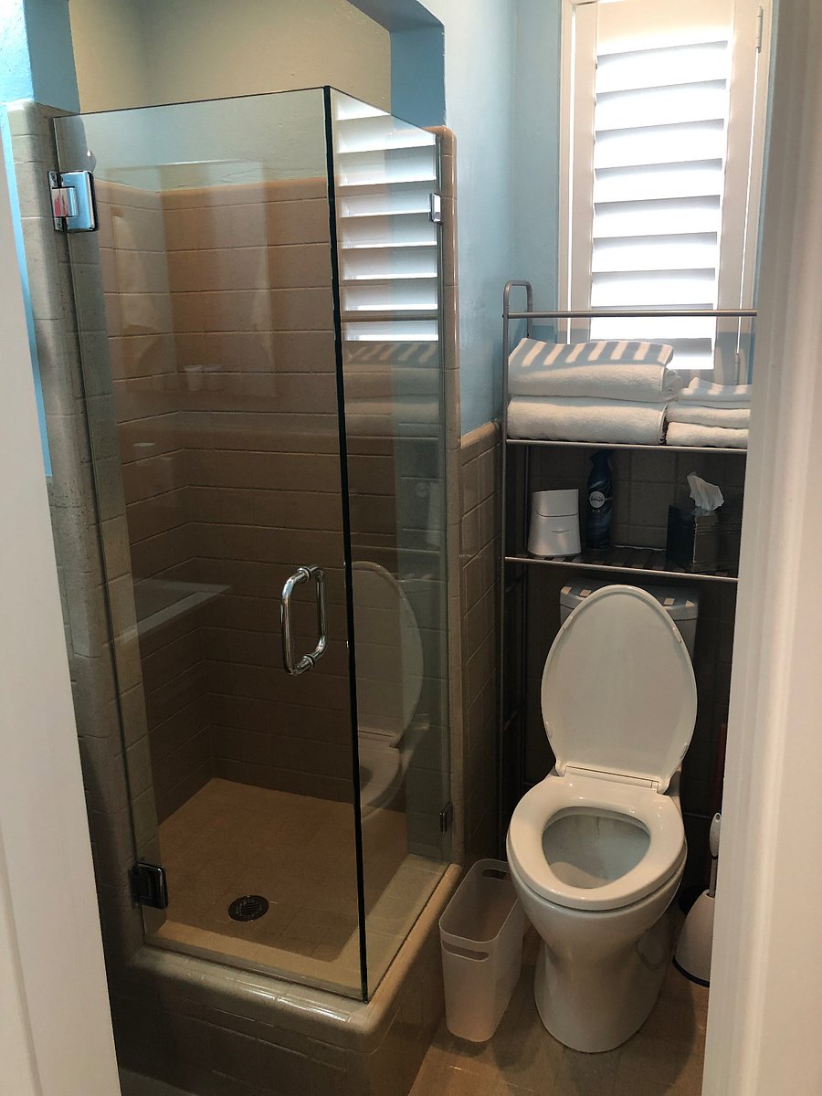 The shower includes a handheld rain forest shower head with various settings to suit your needs after a day at the beach or the pool. There is extra storage for your toiletries