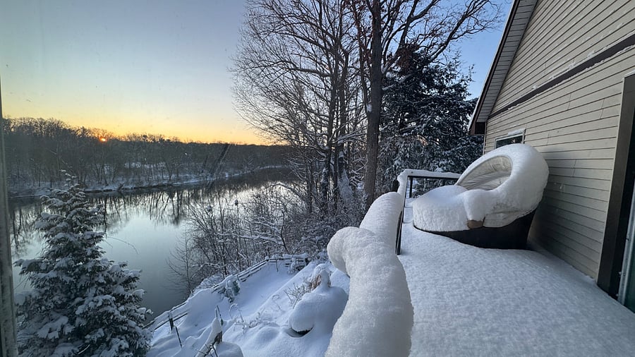 Winter river scene from upstairs deck off of primary bedroom