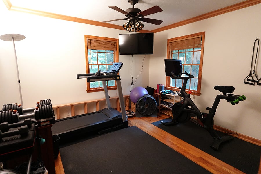 Exercise room with Peloton bike, treadmill, free weights, and TRX suspension training system (can be used as a bedroom if wanted)