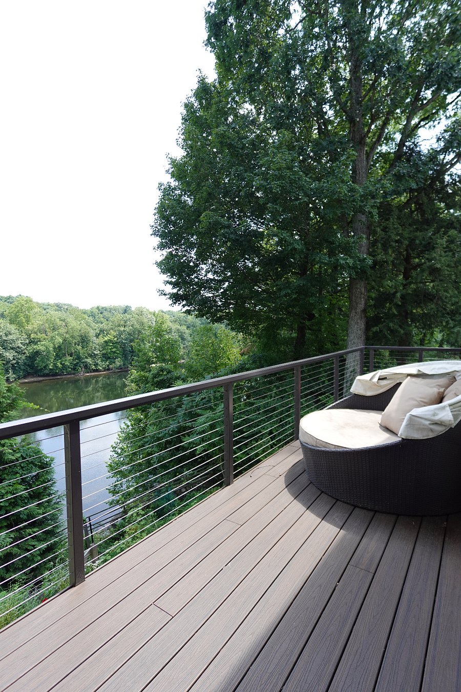 Upstairs deck off of the primary bedroom overlooking the river