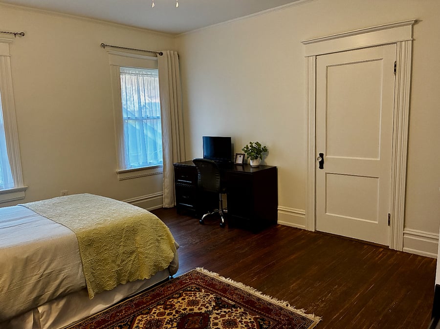 Bedroom: looking at desk and closet